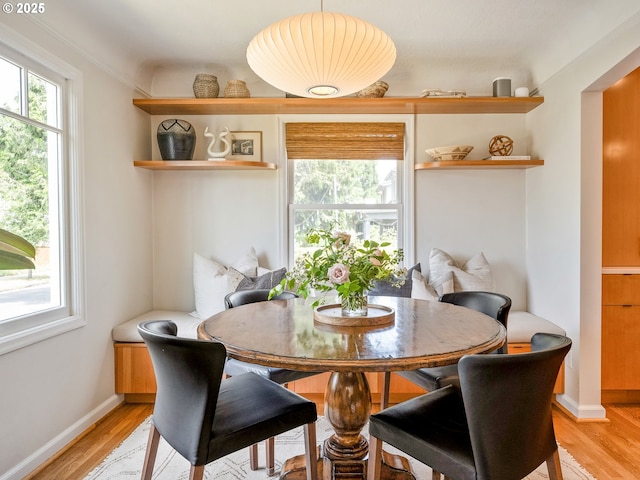 3556 NE Alberta Ct, Portland, OR 97211 - dining area with light wood-style floors and baseboards