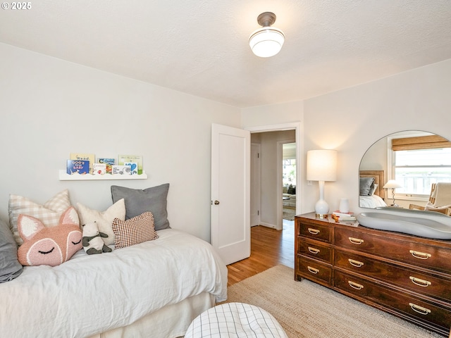 3556 NE Alberta Ct, Portland, OR 97211 - bedroom with light wood-type flooring and multiple windows