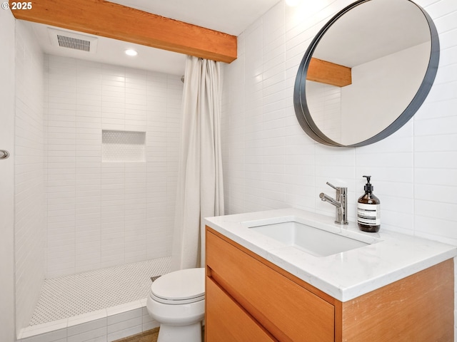 3556 NE Alberta Ct, Portland, OR 97211 - full bath with tile walls, vanity, tiled shower, backsplash, and toilet