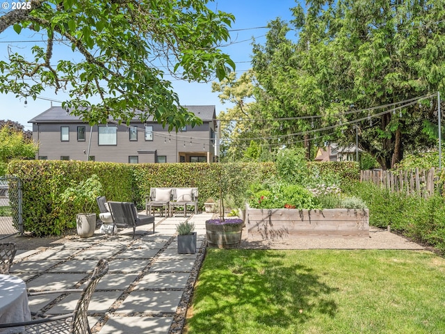 3556 NE Alberta Ct, Portland, OR 97211 - view of patio / terrace with outdoor lounge area and a garden