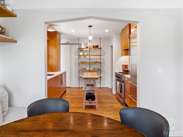 3556 NE Alberta Ct, Portland, OR 97211 - dining space with light wood-type flooring, recessed lighting, and baseboards