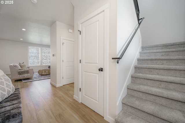 143 W 20th Way, La Center, WA 98629 - stairway with wood finished floors and recessed lighting