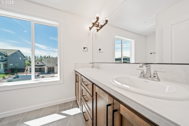 143 W 20th Way, La Center, WA 98629 - full bathroom featuring double vanity and baseboards