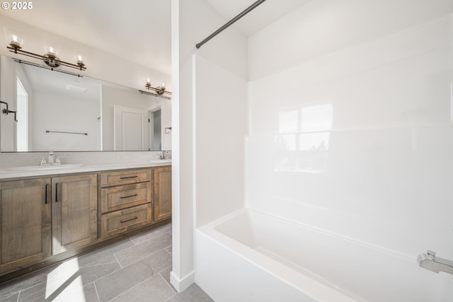 143 W 20th Way, La Center, WA 98629 - bathroom featuring double vanity, shower / tub combination, and tile patterned flooring