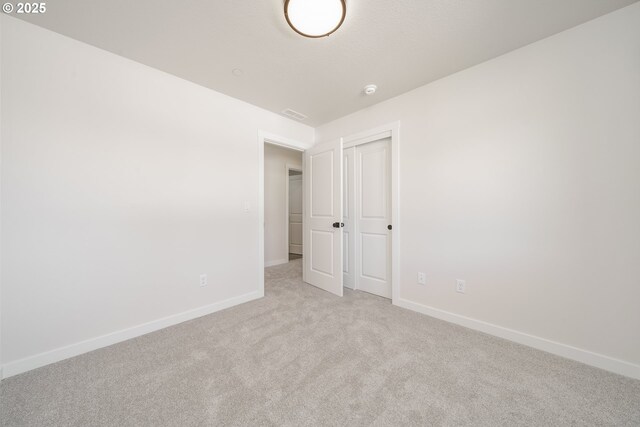 143 W 20th Way, La Center, WA 98629 - empty room with light colored carpet and baseboards