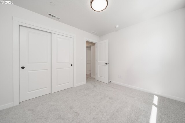 143 W 20th Way, La Center, WA 98629 - unfurnished bedroom featuring carpet and a closet