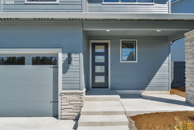 143 W 20th Way, La Center, WA 98629 - property entrance featuring covered porch and a garage