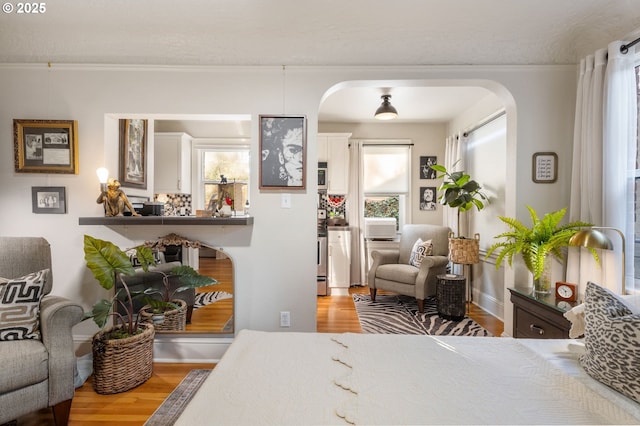 bedroom with hardwood / wood-style floors