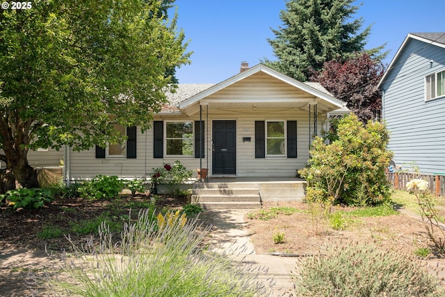 9465 N Midway Ave, Portland, OR 97203 - view of front of property featuring covered porch and roof with shingles