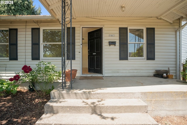 9465 N Midway Ave, Portland, OR 97203 - view of exterior entry featuring a porch