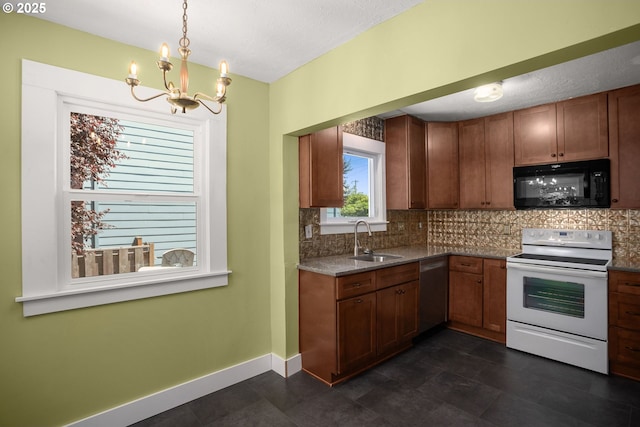 9465 N Midway Ave, Portland, OR 97203 - kitchen featuring black microwave, white electric range oven, stainless steel dishwasher, a chandelier, and tasteful backsplash