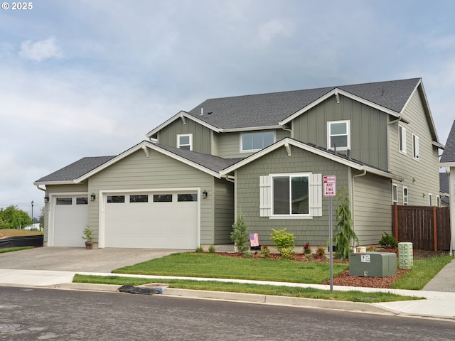 2614 S 7th Way, Ridgefield, WA 98642 - craftsman inspired home featuring board and batten siding, concrete driveway, a garage, and a shingled roof