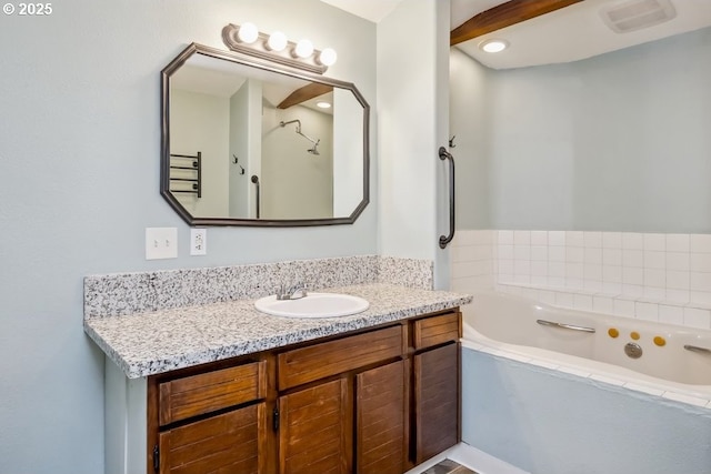 bathroom featuring a bath and vanity
