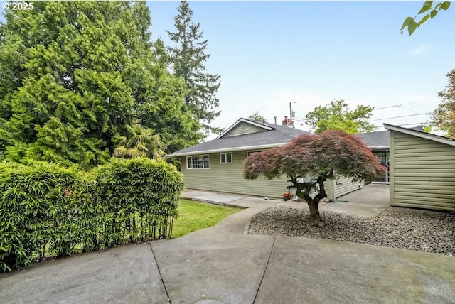 rear view of house featuring a patio area