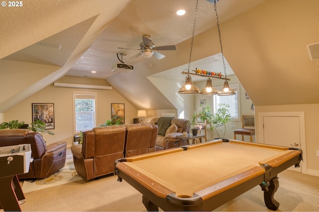 game room with light carpet, ceiling fan, a textured ceiling, and lofted ceiling