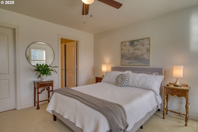 bedroom featuring ceiling fan, carpet floors, and baseboards