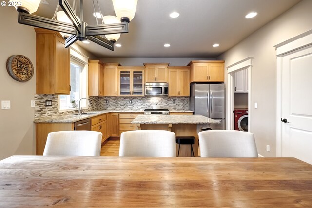 9350 SW Gertz Ln, Tualatin, OR 97062 - dining space with a chandelier, light wood-type flooring, and recessed lighting