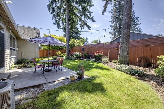 9350 SW Gertz Ln, Tualatin, OR 97062 - view of yard with a patio and central AC unit