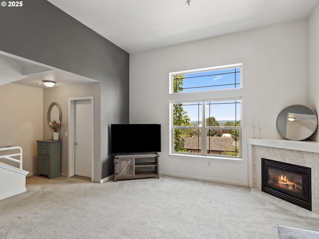 12130 NE Fremont St Unit 4, Portland, OR 97220 - unfurnished living room with a fireplace and carpet
