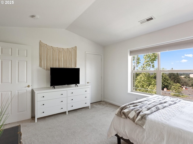 12130 NE Fremont St Unit 4, Portland, OR 97220 - bedroom with lofted ceiling and light carpet
