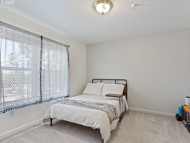 12130 NE Fremont St Unit 4, Portland, OR 97220 - bedroom featuring light colored carpet and baseboards