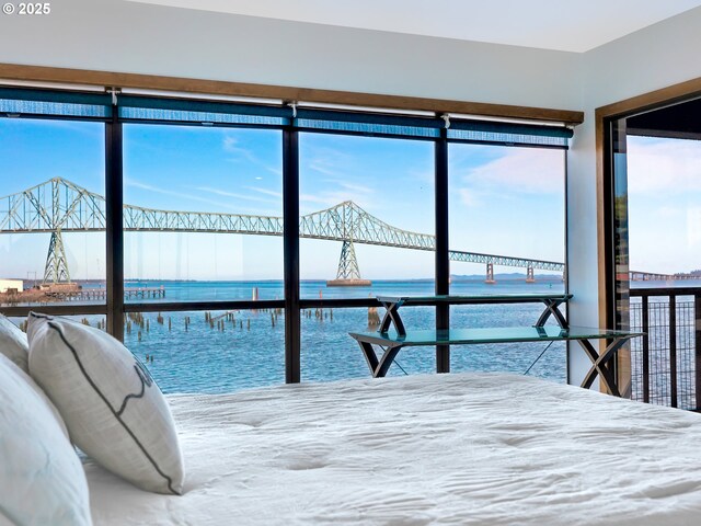 1 3rd St Unit 204, Astoria, OR 97103 - bedroom featuring a water view and multiple windows