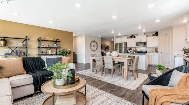 262 Greencrest St, Salem, OR 97301 - living room featuring dark wood-style floors and recessed lighting