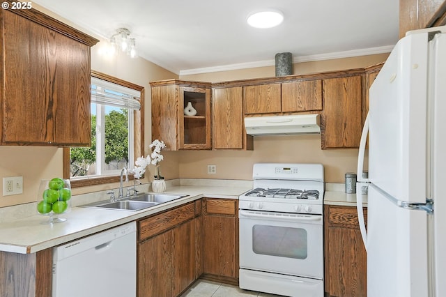 4750 SW 3rd St, Corvallis, OR 97333 - kitchen with white appliances, a sink, under cabinet range hood, brown cabinets, and light countertops
