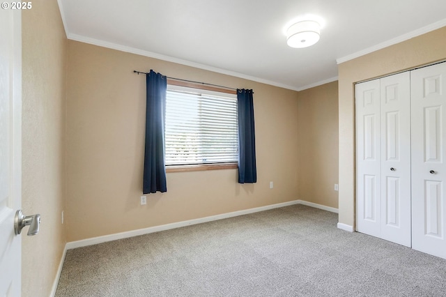 4750 SW 3rd St, Corvallis, OR 97333 - unfurnished bedroom featuring carpet floors, ornamental molding, baseboards, and a closet
