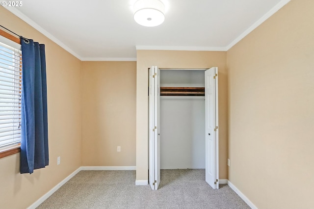 4750 SW 3rd St, Corvallis, OR 97333 - unfurnished bedroom with carpet flooring, crown molding, baseboards, and a closet
