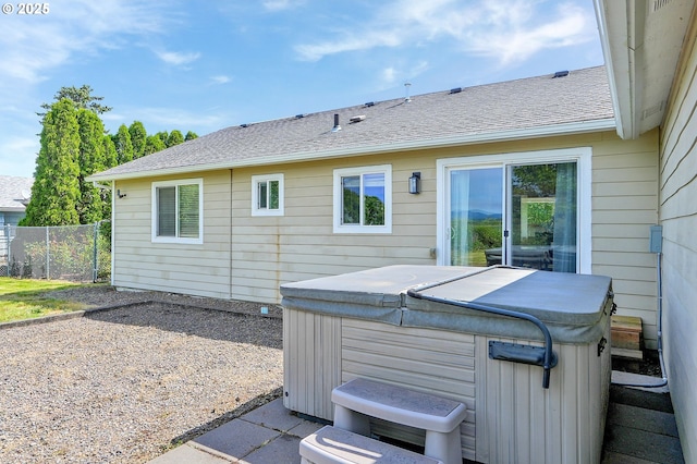 4750 SW 3rd St, Corvallis, OR 97333 - back of property with a hot tub, fence, and roof with shingles
