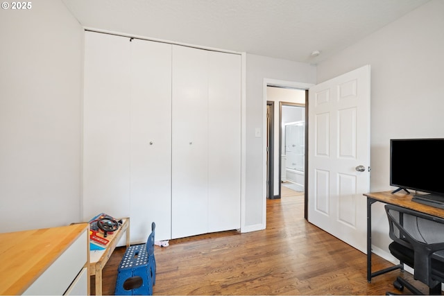 office area with wood finished floors