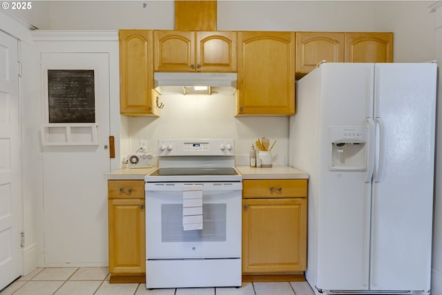 8052 NE Couch St, Portland, OR 97213 - kitchen featuring white appliances, under cabinet range hood, light tile patterned floors, and light countertops
