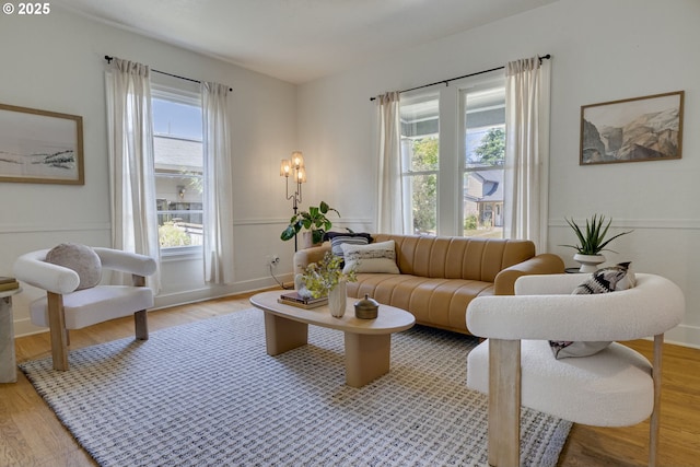 8052 NE Couch St, Portland, OR 97213 - living area featuring light wood-style floors
