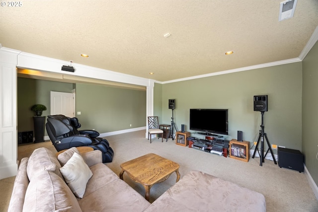 2130 S 26th Ave, Ridgefield, WA 98642 - carpeted living area featuring a textured ceiling, recessed lighting, decorative columns, and ornamental molding
