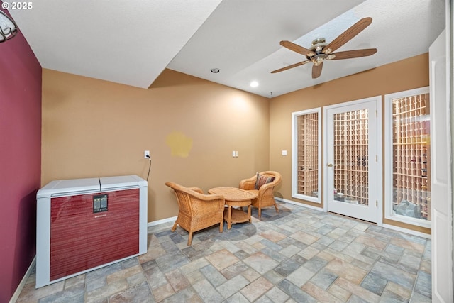 2130 S 26th Ave, Ridgefield, WA 98642 - living area featuring stone finish flooring, a ceiling fan, and recessed lighting