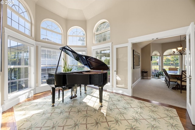 2130 S 26th Ave, Ridgefield, WA 98642 - sitting room with a chandelier, a towering ceiling, and wood finished floors