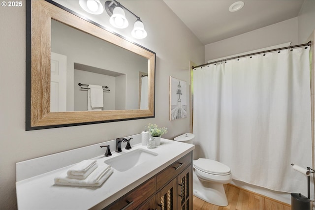 15564 S Neibur Rd, Oregon City, OR 97045 - full bathroom with vanity, a shower with curtain, toilet, and wood finished floors