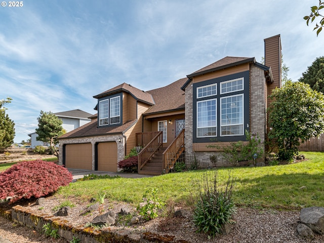 view of front of property featuring driveway, a chimney, roof with shingles, a front lawn, and an attached garage