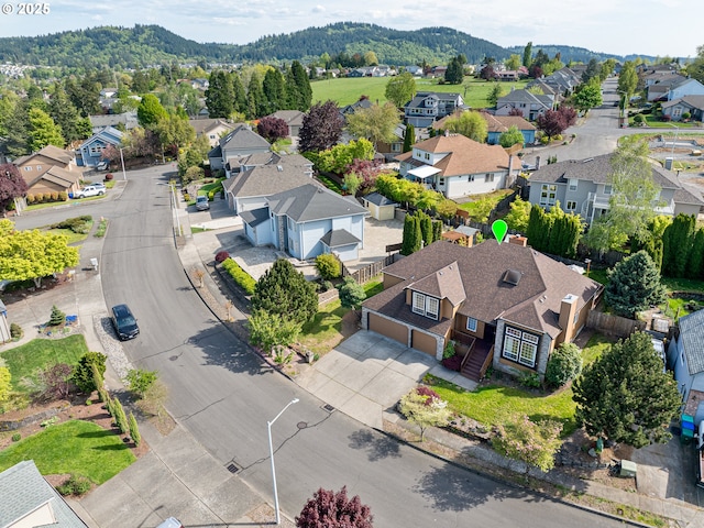 aerial view with a residential view and a mountain view