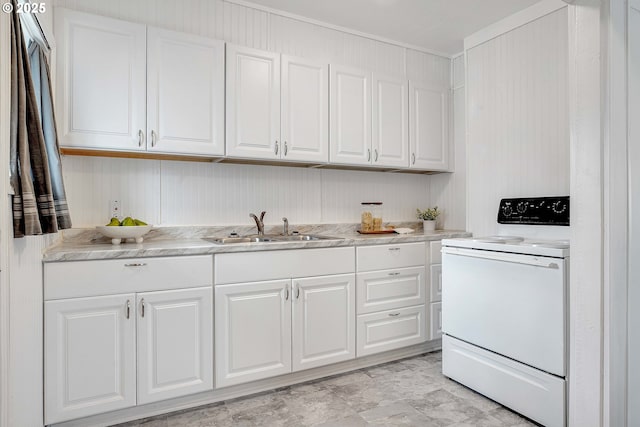 kitchen featuring light countertops, white cabinetry, a sink, and white electric range oven