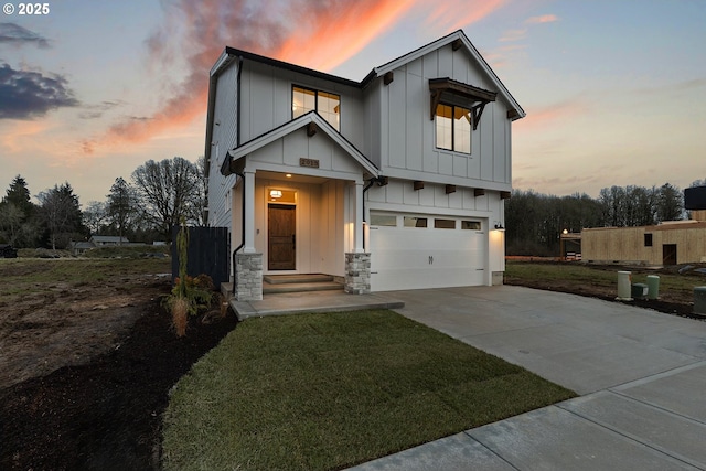 modern farmhouse with a garage and a yard