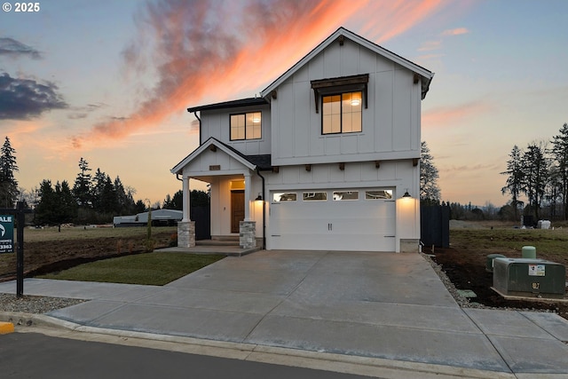 modern inspired farmhouse featuring a garage