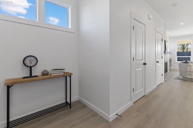 hall featuring light wood-type flooring