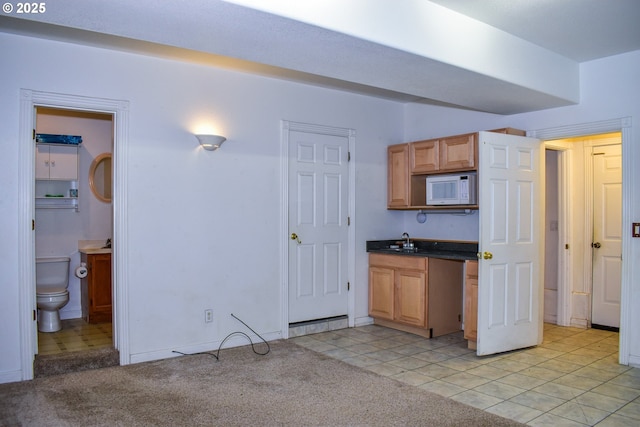 130 Candice Ct, Medford, OR 97504 - kitchen featuring sink and light carpet