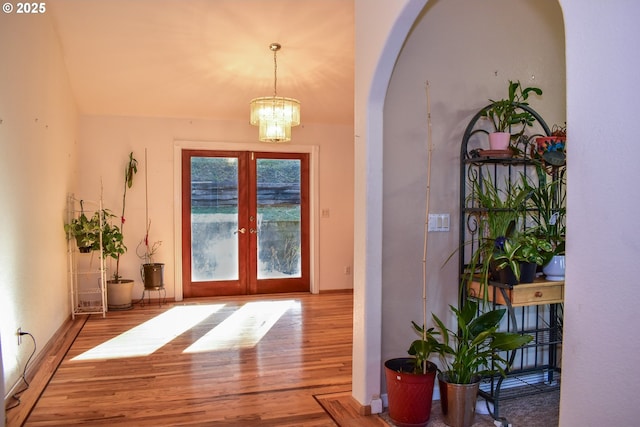 130 Candice Ct, Medford, OR 97504 - doorway featuring french doors, an inviting chandelier, and hardwood / wood-style floors