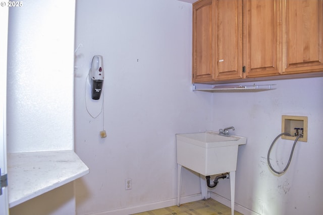 130 Candice Ct, Medford, OR 97504 - laundry area with cabinets, sink, and washer hookup