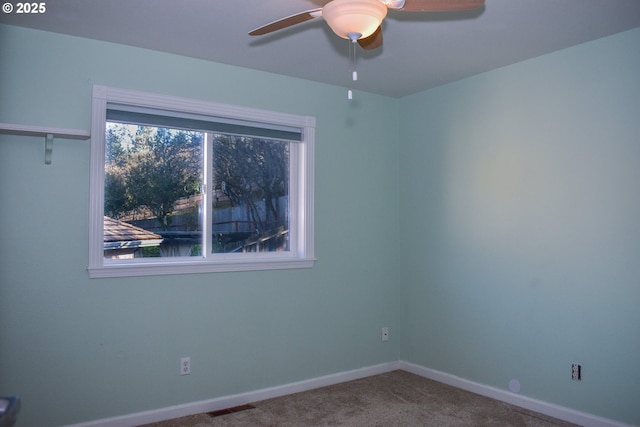 130 Candice Ct, Medford, OR 97504 - carpeted empty room with ceiling fan