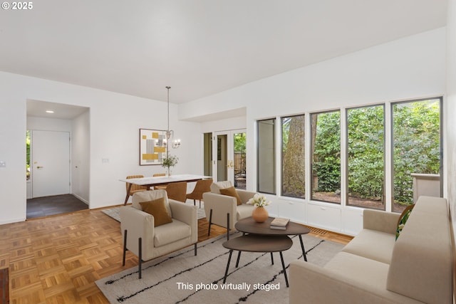589 Ridgeway Rd, Lake Oswego, OR 97034 - living area with baseboards and a chandelier