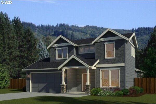 craftsman inspired home featuring a garage, driveway, fence, and a view of trees